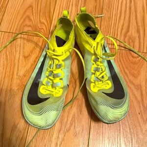 TRACK AND FIELD Worn sprinting spikes